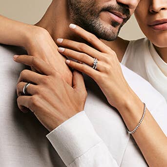 Man and woman wearing David Yurman jewelry.